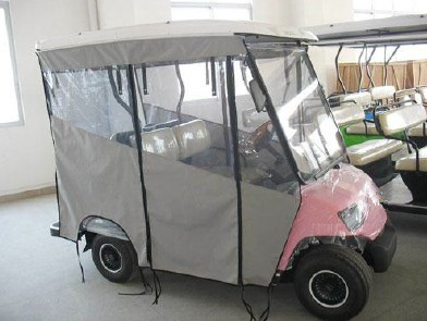 Golf cart with rain cover